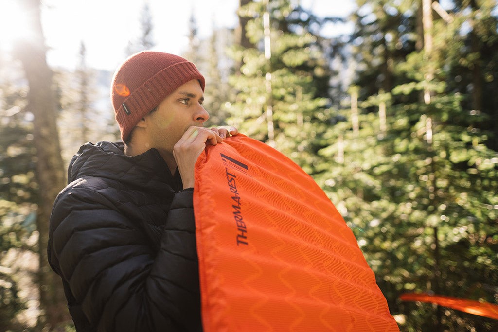 inflating sleeping pad rest of way, Picture